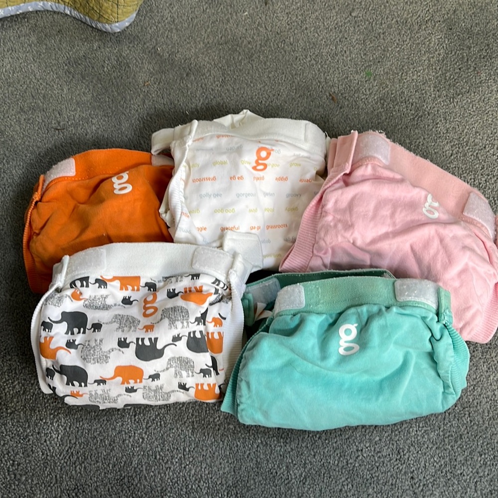 5 small GDiaper pants and plastic covers
